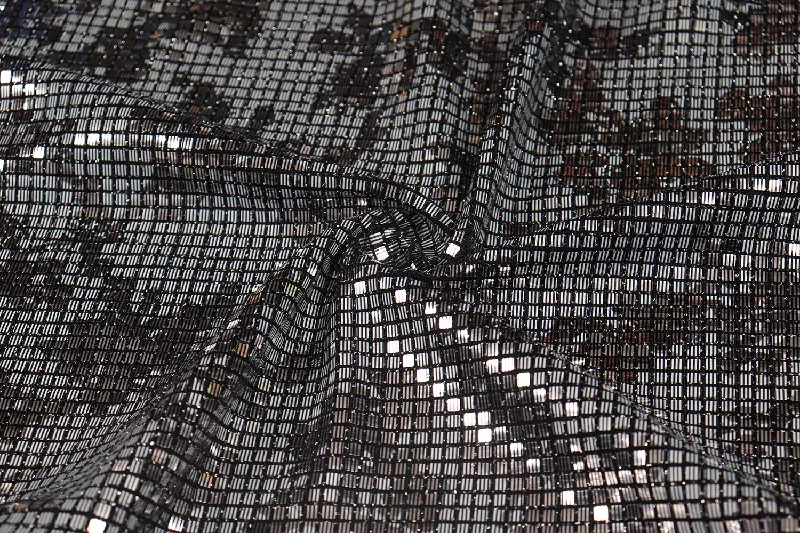 Silver on Black Metallic Knit Fabric