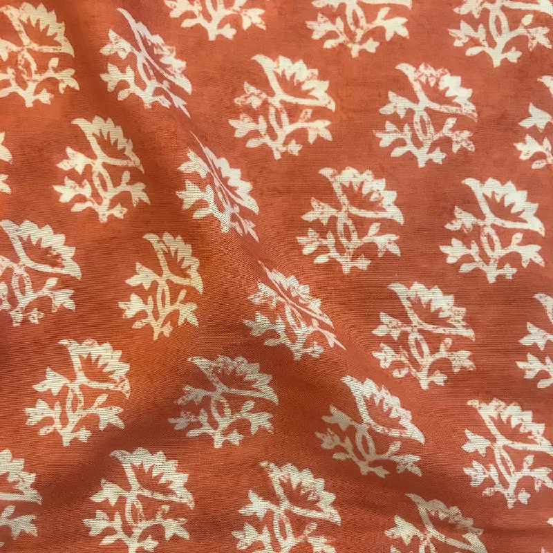 White Motif Rust Orange Viscose Muslin Fabric